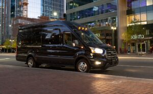 black ford transit on road